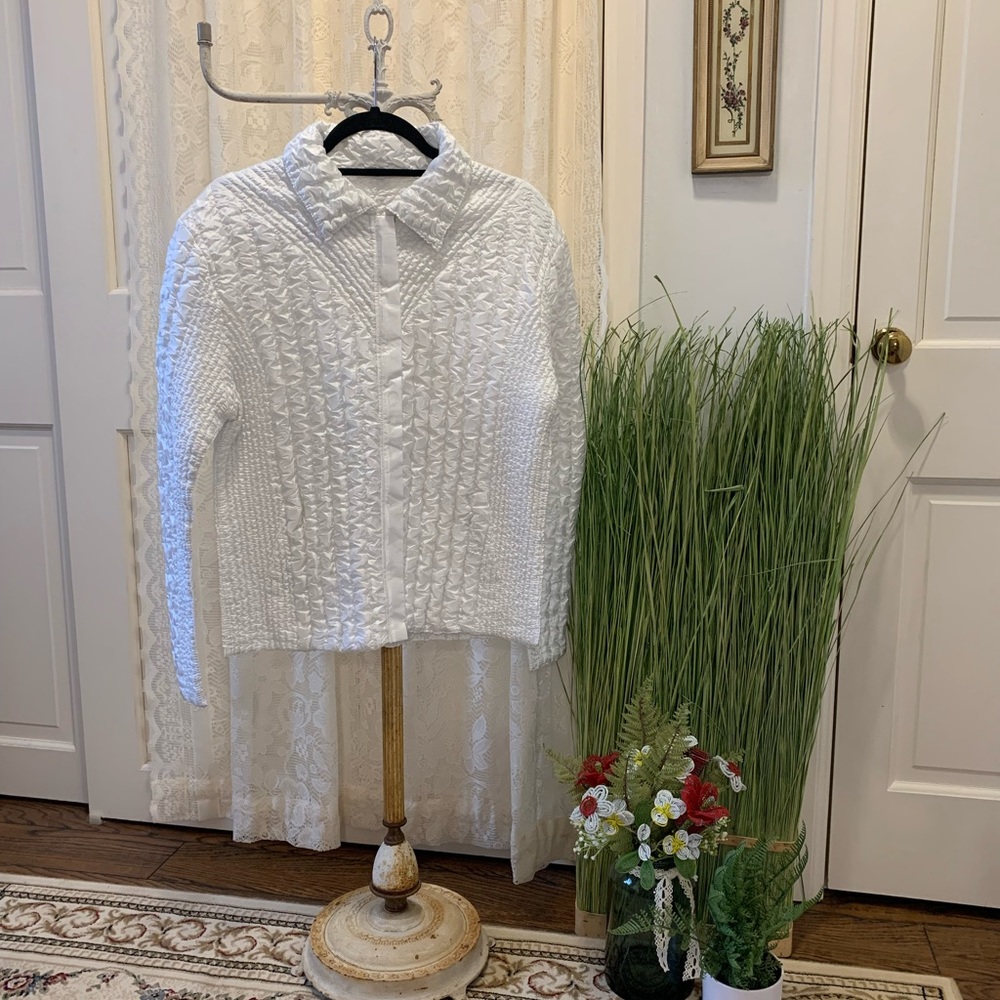 White puffy zip up, long sleeve Jacket or Top